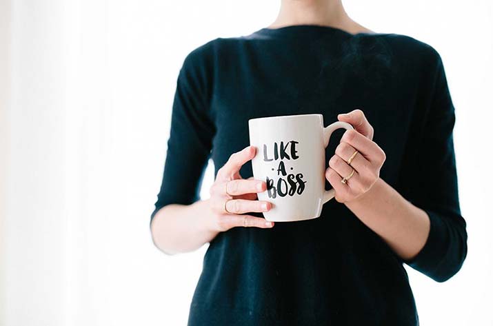 female-holding-a-mug